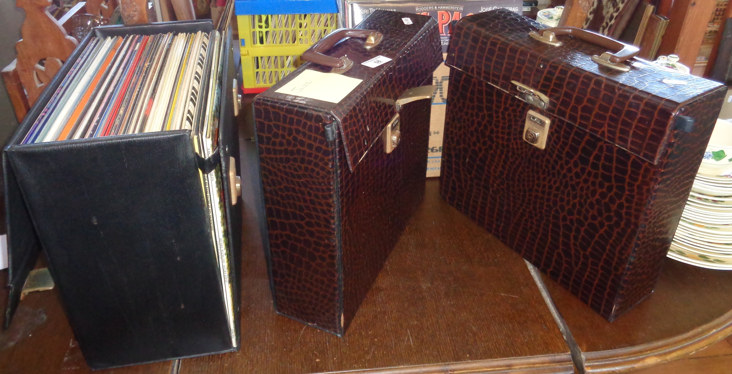 Three cases and a box of vinyl LPs, inc jazz and pop