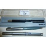 Three Parker pens