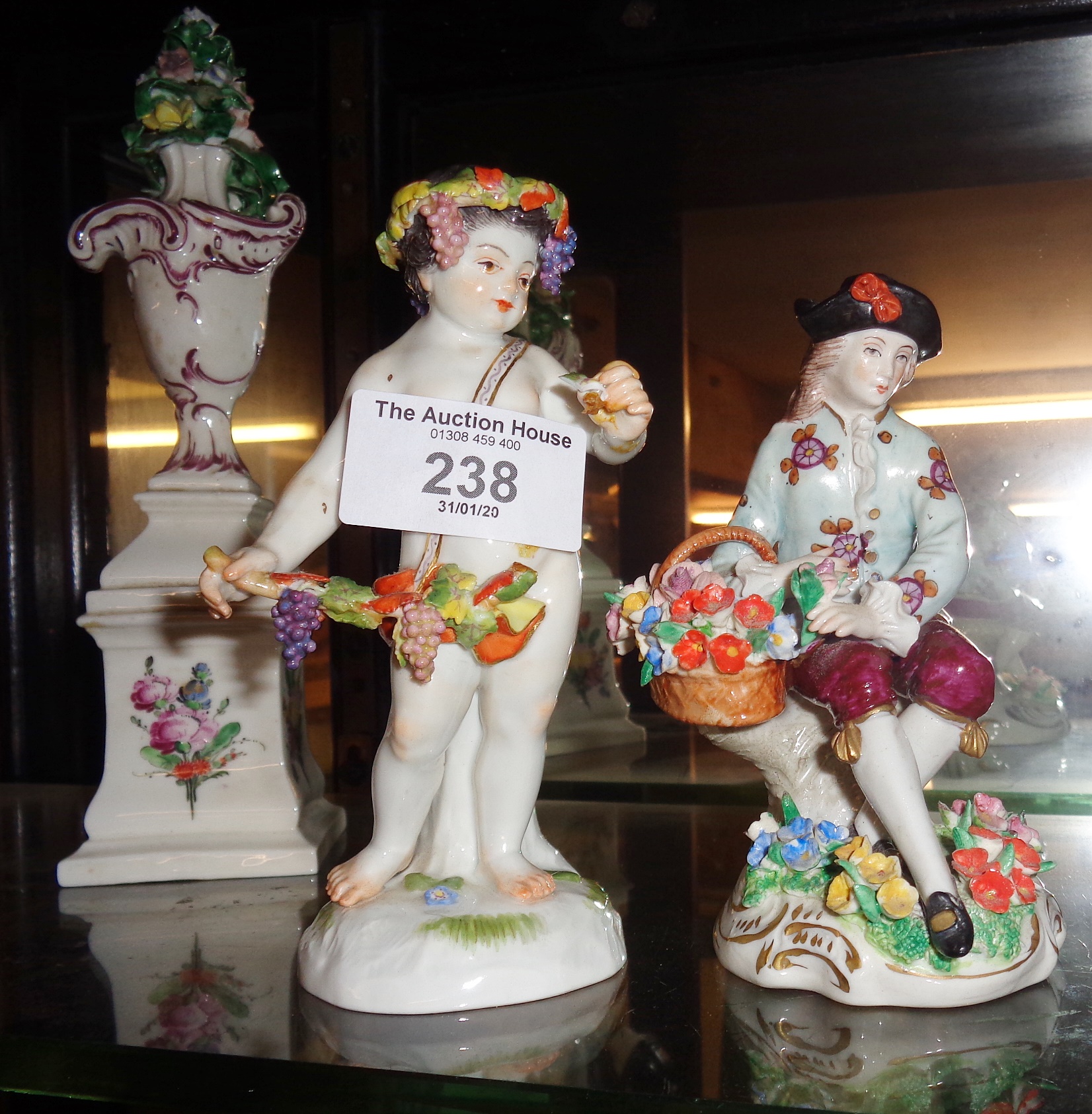 19th c. Meissen figurine of a bacchanalian putti and a Voigt Sitzendorf porcelain figure - Image 2 of 2