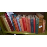 Shelf of hardback novels, inc. P.G. Wodehouse