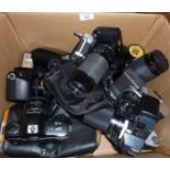 Box of assorted cameras, inc. Praktica, Olympus, Canon, Pentax, etc., together with lenses and
