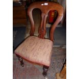 Mahogany spoon-back dining chair with paisley seat