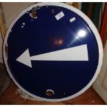 French round enamel traffic sign with white arrow on blue background