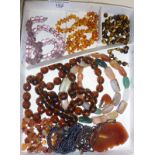 Assorted vintage beaded necklaces, including amber, tiger's eye, etc.