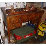 Edwardian walnut kneehole desk with four drawers on square tapering legs