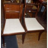 Pair of Regency mahogany sabre leg dining chairs with rope-twist top rail