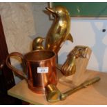 Large Victorian copper tankard inscribed "Sudeley Manor", and a pair of brass dolphins, together