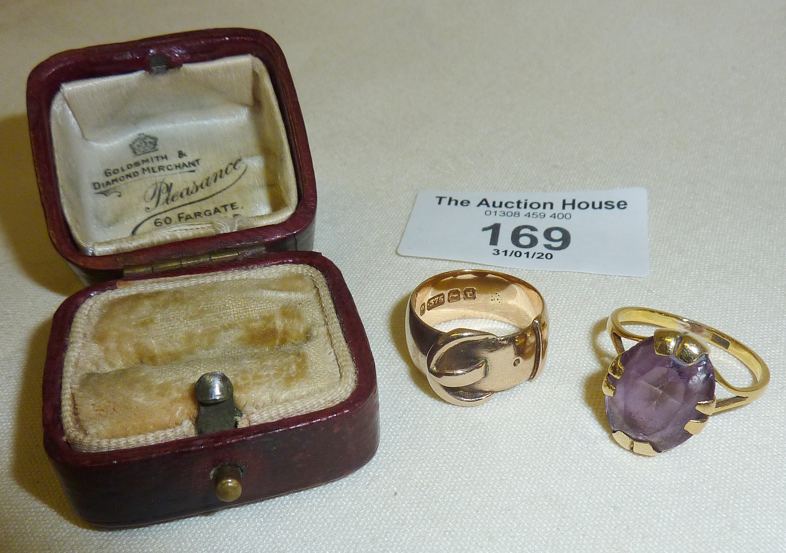 Victorian 9ct rose gold buckle ring, and a 9ct dress ring with amethyst stone, together with an