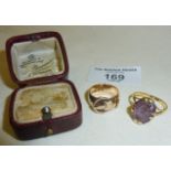 Victorian 9ct rose gold buckle ring, and a 9ct dress ring with amethyst stone, together with an