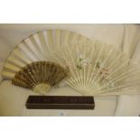 Three Victorian fans with pierced ivory guards (some damage), together with original Fred