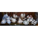 Shelf of tea ware, inc. Tuscan china, Copeland Spode, Aynsley Embassy pattern, Cauldon china, etc.