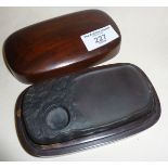 Chinese or Japanese inkstone with carved prunus decoration, in wooden case