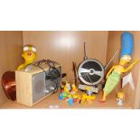 A Bush DAB/FM portable radio, model 356/6314 and a quantity of Simpsons plastic figures