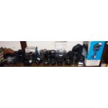 Collection of assorted SLR cameras, lenses and flash guns
