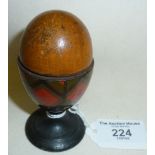 Treen Tartanware sewing thread and thimble holder shaped as an egg in an egg cup. Containing