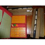 Mah Jong set in leather case and four lacquered tile racks and boxes