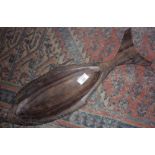 Tribal Art: A Papua New Guinea carved Paldao wood food bowl in the shape of a fish