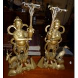 Two Chinese bronze figural candlesticks, 15.5" high