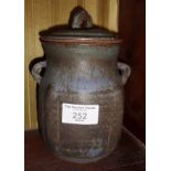 Ash glazed studio pottery stoneware jar with incised marks, and signed under "BLS"