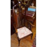 Art Nouveau English mahogany open armchair having high arch topped back with carved centre splat and