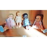 Four various "Pedigree" type vintage dolls, inc. a black baby doll