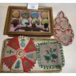 Victorian glazed box containing a beadwork kit, together with three finely sewn examples