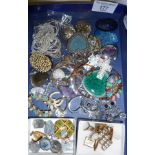 Assorted vintage costume jewellery, along with some religious pendants, and mother-of-pearl