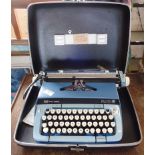 A Smith Corona Galaxie Twelve typewriter with case