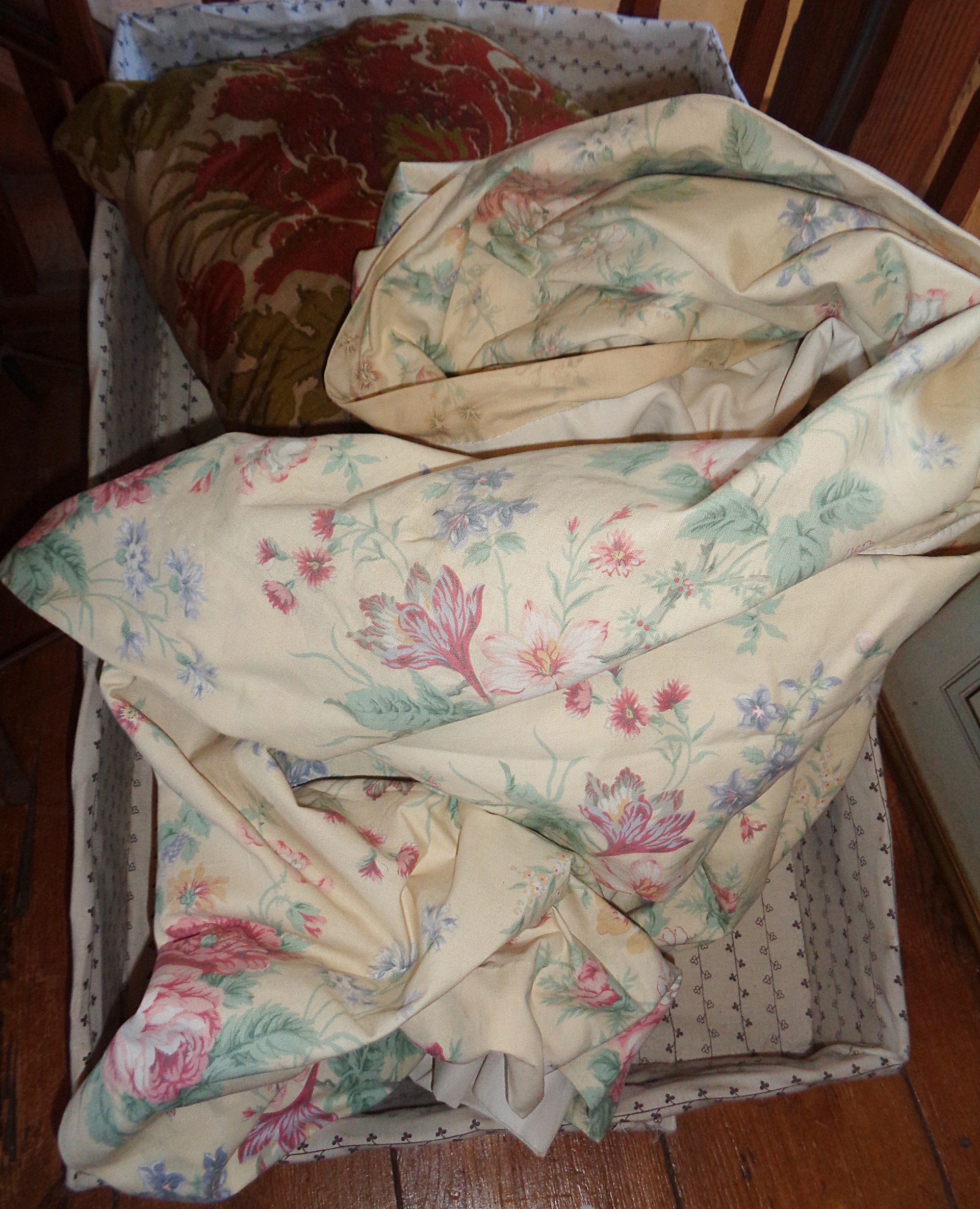Fabric covered baguette basket tray and a pair of Sanderson curtains and a cushion