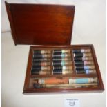 Victorian ceramic artist or painter's paint set in wooden box with sliding lid, containing vials