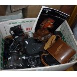 Crate of assorted cameras