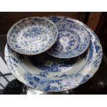 Chinese Kangxi blue and white charger with foliate decoration, approx. 39cm diameter and two other