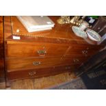 19th c. mahogany chest of four drawers on bracket feet with line inlay