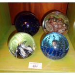 Four glass paperweights, inc. Caithness