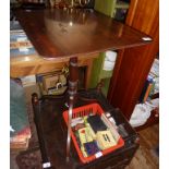 Georgian mahogany snap-top wine table having rectangular top on turned centre column above arched