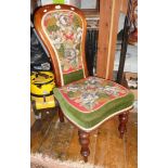 Victorian mahogany spoon-backed nursing chair having embroidered seat and back