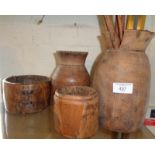 Tribal Art - four wooden vessels and a bundle of cassia bark sticks