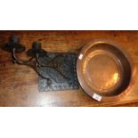 Persian copper alms dish and a hand-forged double sconce wall bracket candlestick