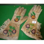 A pair of Native American Indian Chippewa hide and floral beadwork gauntlets with fringes,
