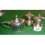 Pair of silver pepper grinder (London 1990), and an oval Adams-style pierced silver mustard pot with