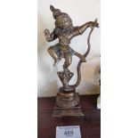 An Indian bronze figure of Krishna dancing on a snake, 19cms tall