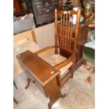 Victorian oak rush seated spindle back nursing chair, and a low drop-leaf table