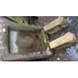 Old stone sink with two supports