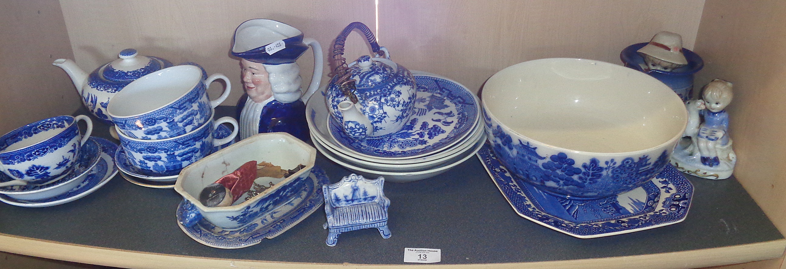 Shelf of assorted blue and white china, inc. Doulton "Willow" bowl and others