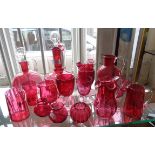 Large quantity of cranberry glass, inc. two wine flagons, jugs and glasses, etc. (17)