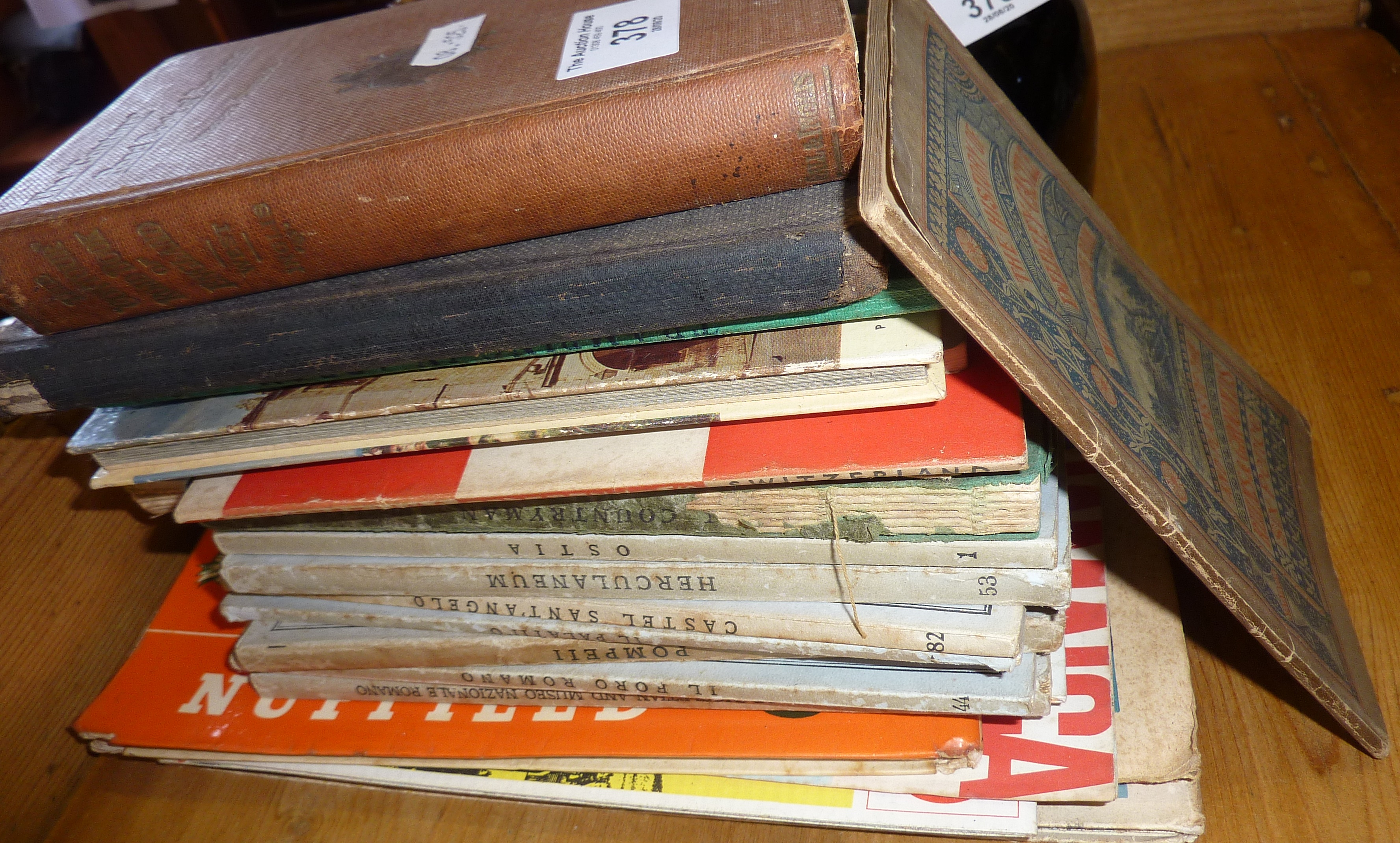 Assorted old guidebooks and maps