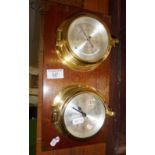 A Garside & William 'ships' barometer and clock mounted on wood panel