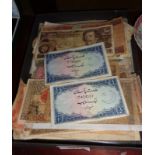 Collection of assorted banknotes including WW2 Philippine Guerilla currency issued during the