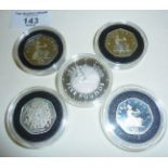 Four Royal Mint silver proof 50p coins, 3 x 1997, 1 x 1998, and a 1999 silver proof £5 coin