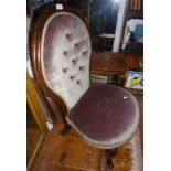 Victorian balloon back upholstered nursing chair on cabriole legs